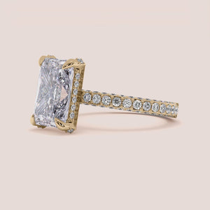 """14K yellow gold radiant hidden halo engagement ring with 3D pave details, perfect for the modern couple.""
