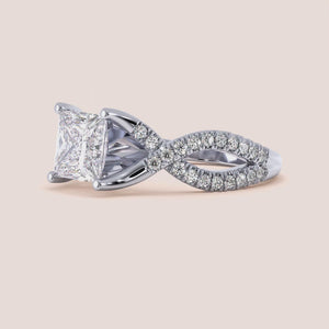 "14K white gold Myla ring set with princess-cut diamonds and twisted pave band, perfect for elegant engagements.