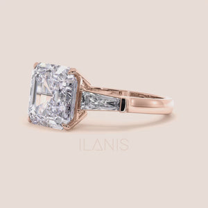 A woman's hand displaying a rose gold engagement ring with a radiant cut diamond, exemplifying elegance and sophistication 