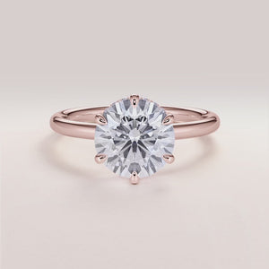 "Rose Gold 14K Vulcan round engagement ring with an invisible gallery, hidden halo, and plain band for modern elegance.