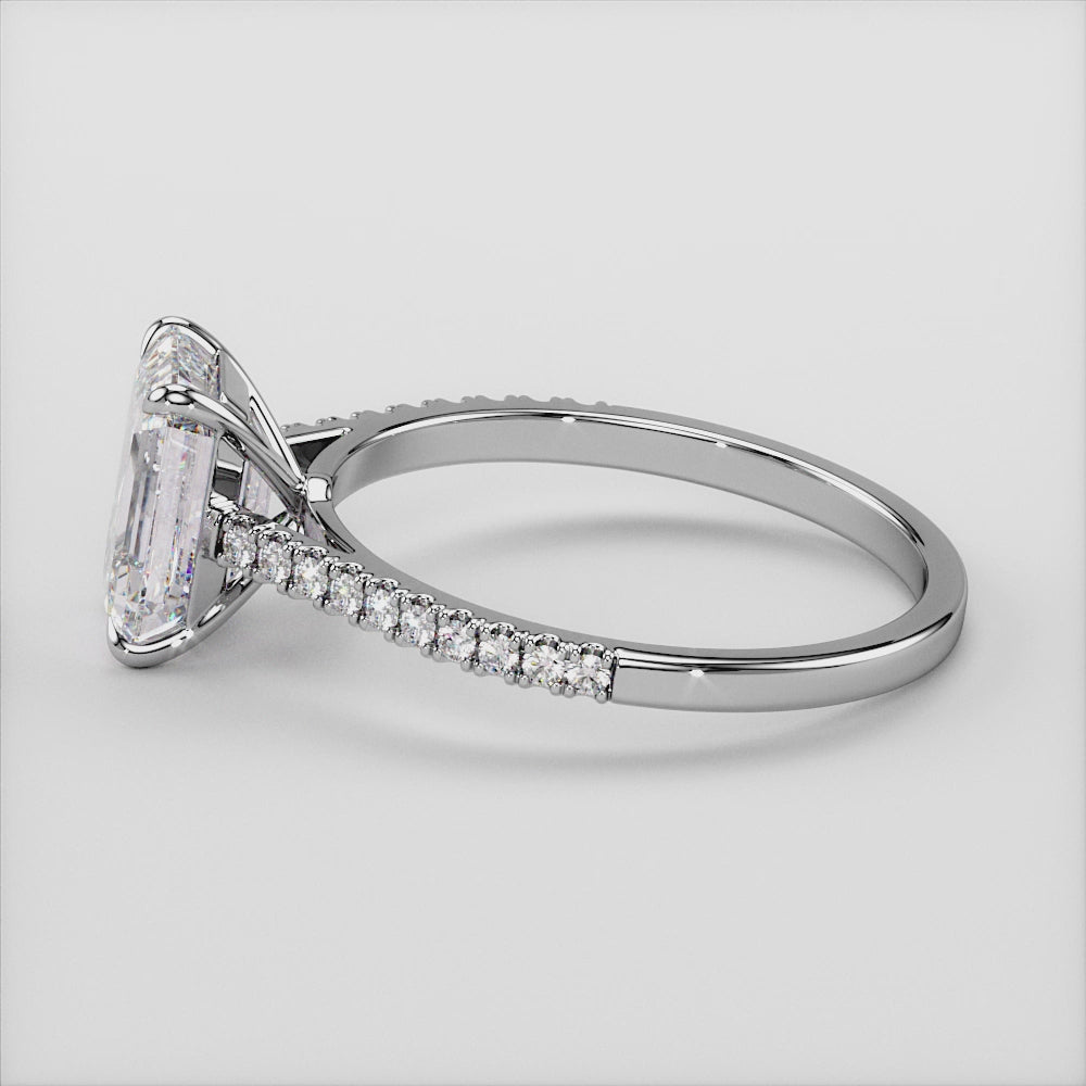 "Elegant 14K white gold emerald solitaire engagement ring with pave accents in a cathedral setting, perfect for timeless romance.|

#14KRecycledWhiteGold
#18KRecycledWhiteGold
#14KRecycledRoseGold
#18KRecycledRoseGold
#14KRecycledYellowGold
#18KRecycledYellowGold














#Platinum"
