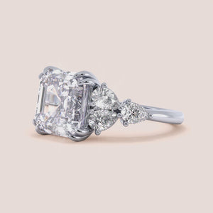 "White Gold 14K/18K engagement ring featuring an Asscher pear cut center stone and side diamonds, exquisite and elegant design.