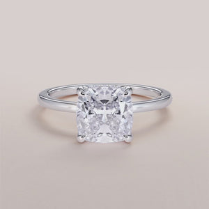 Elegant 14K White Gold Cushion Hidden Halo Engagement Ring with Oval Diamond, Not Worn on Model.