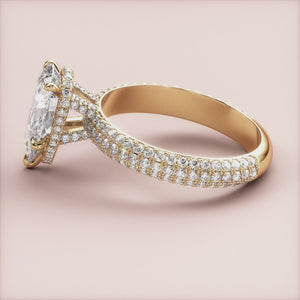 "Elegant 14K Yellow Gold Despina pear engagement ring with hidden halo accents and 3D pave prongs, perfect for timeless proposals.