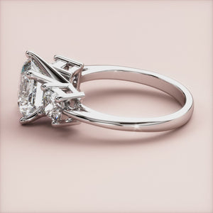 "14K white gold Floras princess three stone engagement ring glimmering with elegance and sophistication, perfect for unforgettable moments.