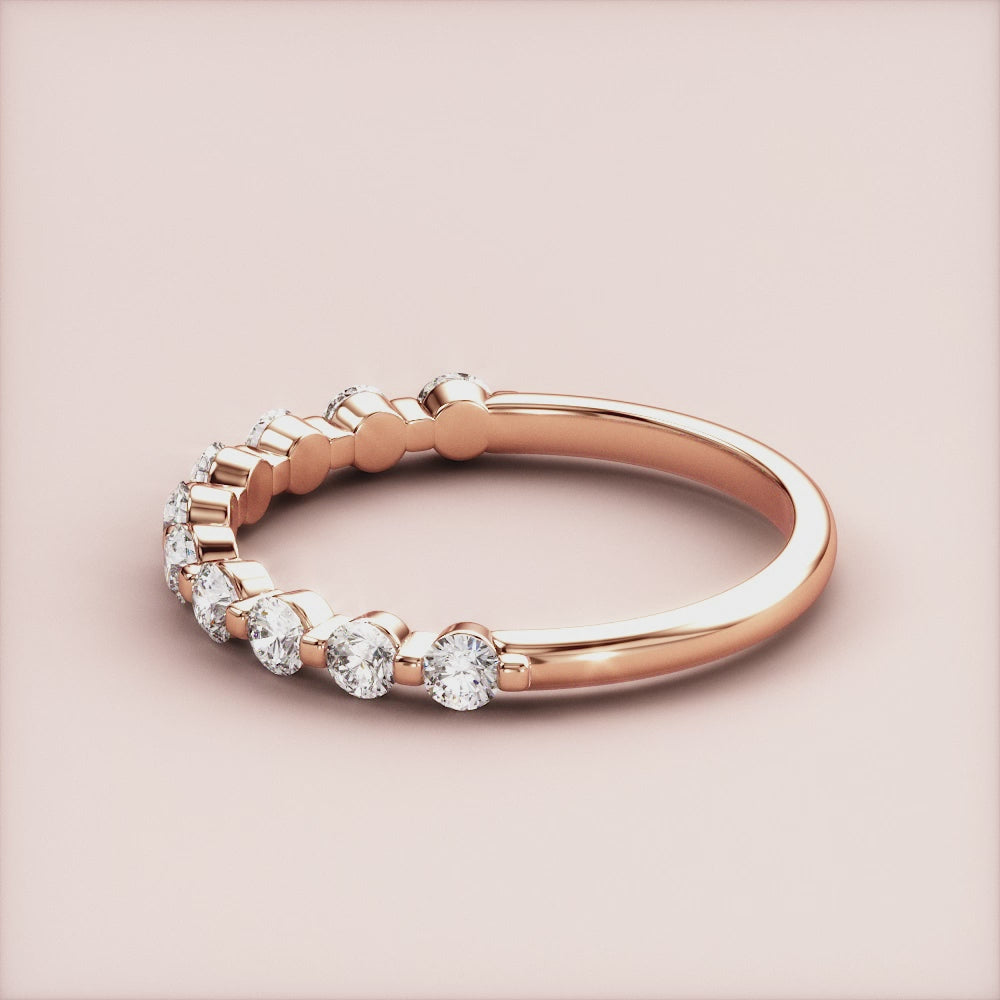 Elegant 14K rose gold half eternity wedding band with shared prong setting and dazzling round brilliant-cut diamonds. |
 
 
 
 
 #14KRecycledRoseGold
 #18KRecycledRoseGold