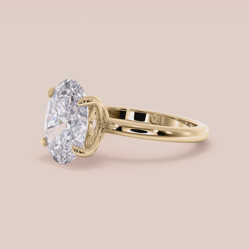 "Yellow gold 18K engagement ring with demi oval tulip mount and plain band, perfect for timeless elegance and romance.|




#14KRecycledYellowGold
#18KRecycledYellowGold





"
