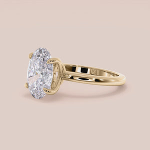 "Yellow gold 18K engagement ring with demi oval tulip mount and plain band, perfect for timeless elegance and romance.