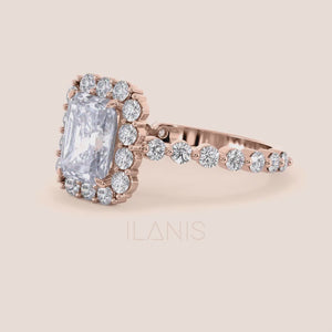 Video of radiant-cut halo diamond ring highlighting detailed diamond-studded band crafted in rose gold 