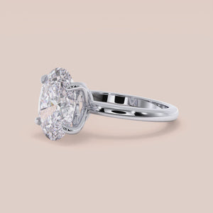 "Elegant 14K white gold engagement ring featuring a demi-oval tulip mount and a plain band, perfect for timeless romance.