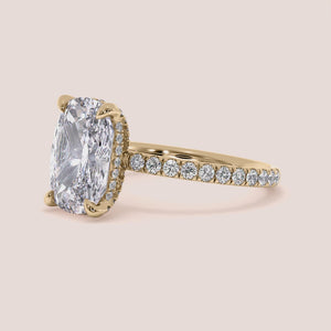 14K yellow gold engagement ring featuring a marquise-cut diamond and pave setting, exuding timeless luxury and elegance.
