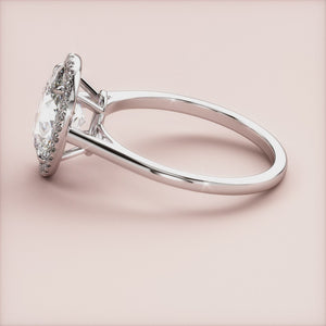 Elegant engagement ring featuring a round brilliant-cut diamond in aPave halo, available in 14K & 18K gold or platinum.