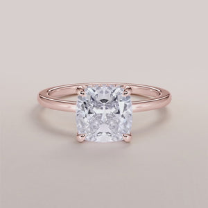 Elegant marquise diamond engagement ring in 14K rose gold, showcasing a thin band and stunning prong-set diamond.