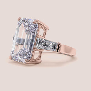 Rose gold 14K pear engagement ring with hidden halo accents and 3D pave design, perfect for a unique proposal or special occasion. 