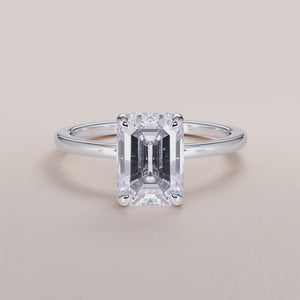 Elegant 14K white gold Libra engagement ring featuring an emerald hidden halo and a sleek plain band, perfect for timeless sophistication.