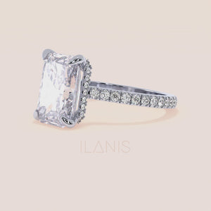 Vertical side view of white gold radiant cut diamond engagement ring with pavé band, highlighting structure, craftsmanship and fine diamond setting 