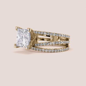 "Elegant princess-cut diamond ring in 14K or 18K gold or platinum, adorned with a stunning row of round diamonds."
