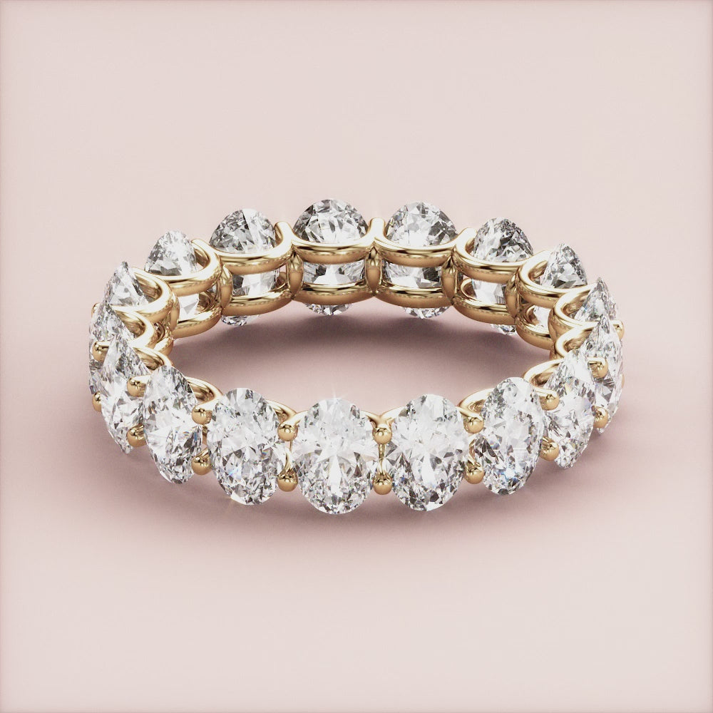 Elegant 14K yellow gold eternity wedding band with round brilliant cut diamonds, offering a luxurious and timeless design. |
 
 
 #14KRecycledYellowGold
 #18KRecycledYellowGold