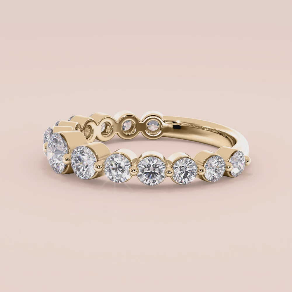 Elegant 14K gold wedding band with shared prong round brilliant diamonds, perfect for special occasions or everyday elegance. |
 
 
 #14KRecycledYellowGold
 #18KRecycledYellowGold