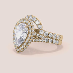 Yellow gold pear diamond engagement ring set with double halo and matching band, elegant bridal set and timeless proposal ring 