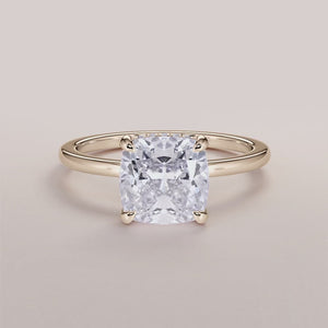 Elegant 14K yellow gold engagement ring with cushion hidden halo and marquise-cut diamond, perfect for timeless elegance.
