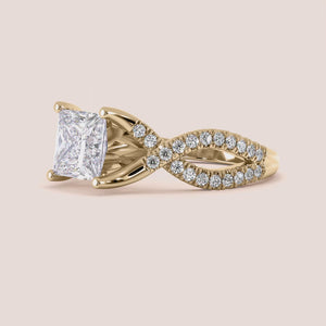 Elegant 14K/18K gold or platinum princess cut diamond ring with intricate infinity design, adorned with smaller diamonds.