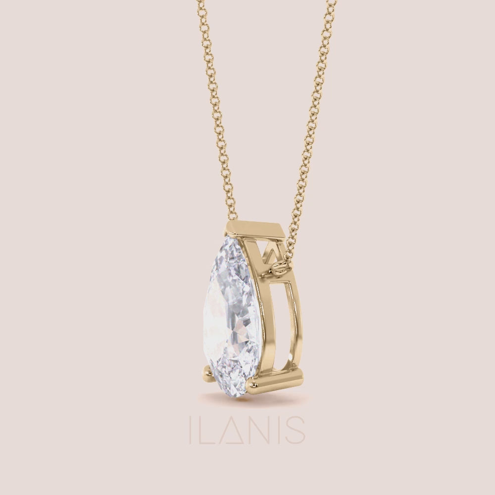 Yellow gold pear diamond pendant necklace on model, delicate solitaire necklace, perfect gift for her and everyday elegance | #14KRecycledYellowGold #18KRecycledYellowGold