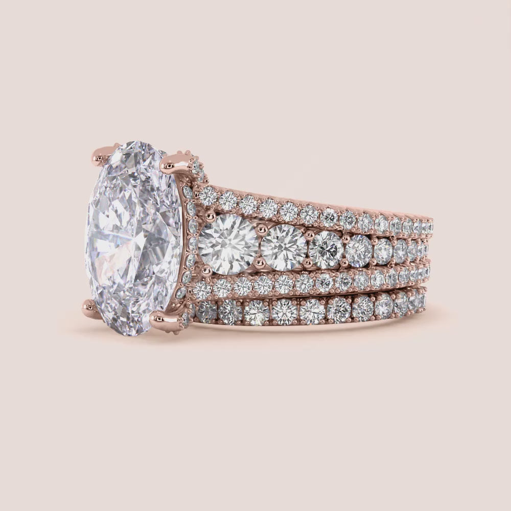 "Rose gold 14K engagement ring, oval hidden halo with prong accents and three-row band, perfect for enhancing romantic moments.|







#14KRecycledRoseGold
#18KRecycledRoseGold


"
