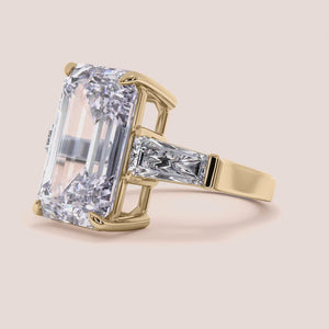 14K yellow gold Emery pear engagement ring with hidden halo accents and 3D pave prongs, perfect for timeless elegance.