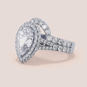 White gold pear diamond engagement ring set with halo and matching band, refined bridal set and timeless engagement ring 