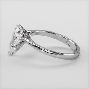 Elegant pear-shaped diamond engagement ring in 14K or 18K white gold, classic solitaire design on a white background.