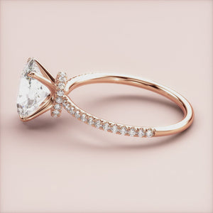 "Rose Gold 14K oval solitaire halo collar engagement ring with pave band, a stunning choice for timeless elegance.