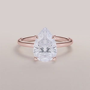 "14K Rose Gold Ophelia Pear Classic Solitaire Engagement Ring, elegant design perfect for timeless love and memorable proposals.