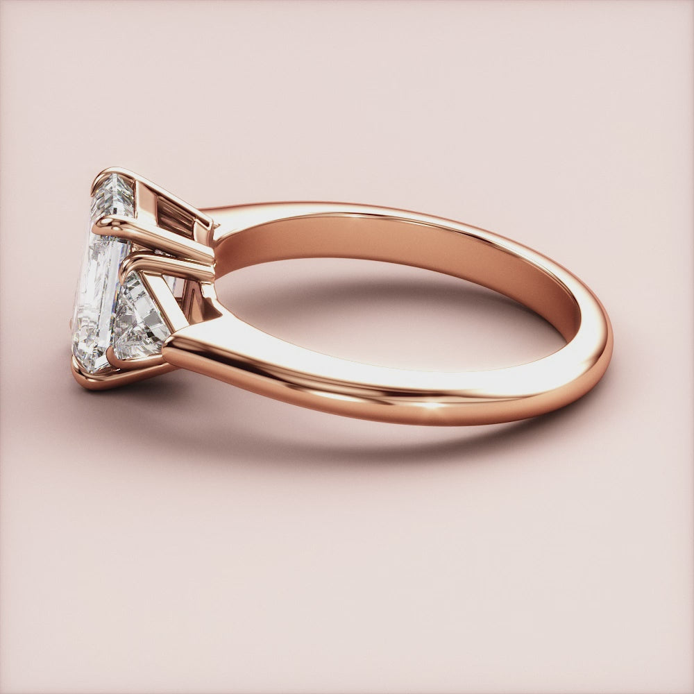 "Rose Gold 14K Emerald Three Stone Triangle Engagement Ring, a stunning choice for couples seeking elegance and timeless beauty.|







#14KRecycledRoseGold
#18KRecycledRoseGold


"

