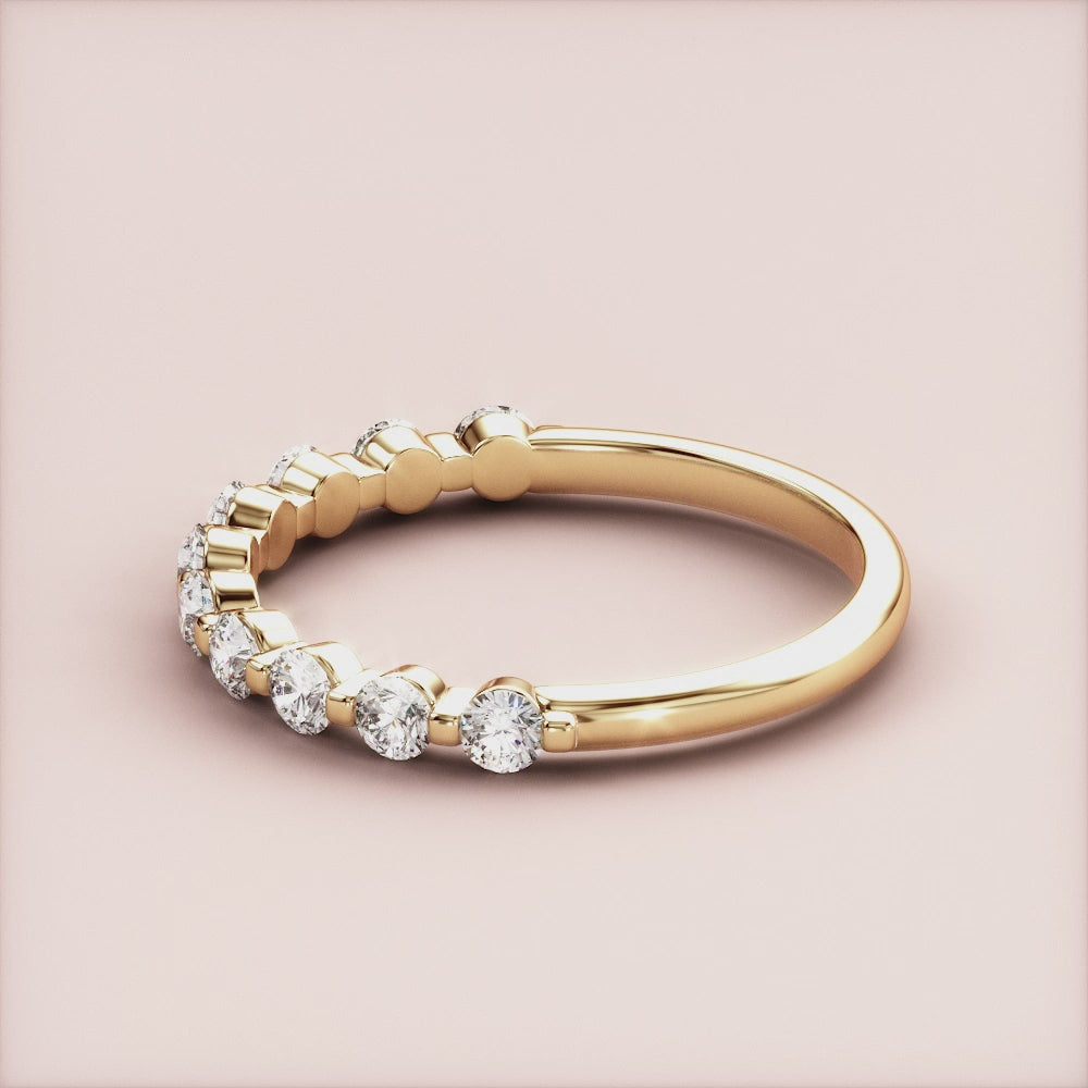 Elegant 14K or 18K yellow gold eternity band with round brilliant-cut diamonds, perfect for timeless wedding jewelry. |
 
 
 #14KRecycledYellowGold
 #18KRecycledYellowGold