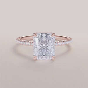 Elegant 14K rose gold engagement ring with marquise-cut diamond andPave diamonds, perfect for timeless romance.