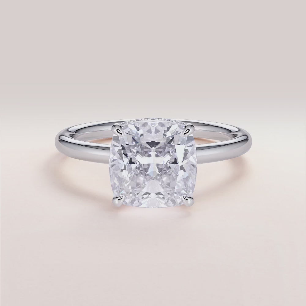 "Elegant 14K white gold engagement ring featuring an Oberon cushion cut with an invisible gallery and hidden halo, plain band design.|

#14KRecycledWhiteGold
#18KRecycledWhiteGold








#Platinum"
