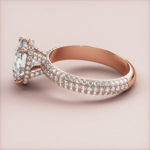 Elegant rose gold marquise diamond engagement ring withPave accents and halo setting, available in 14K, 18K, or platinum.
