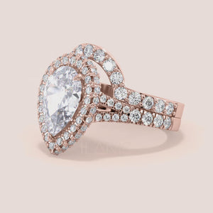 Pear diamond halo ring set in rose gold with matching band, detailed side profile, timeless engagement and wedding set 
