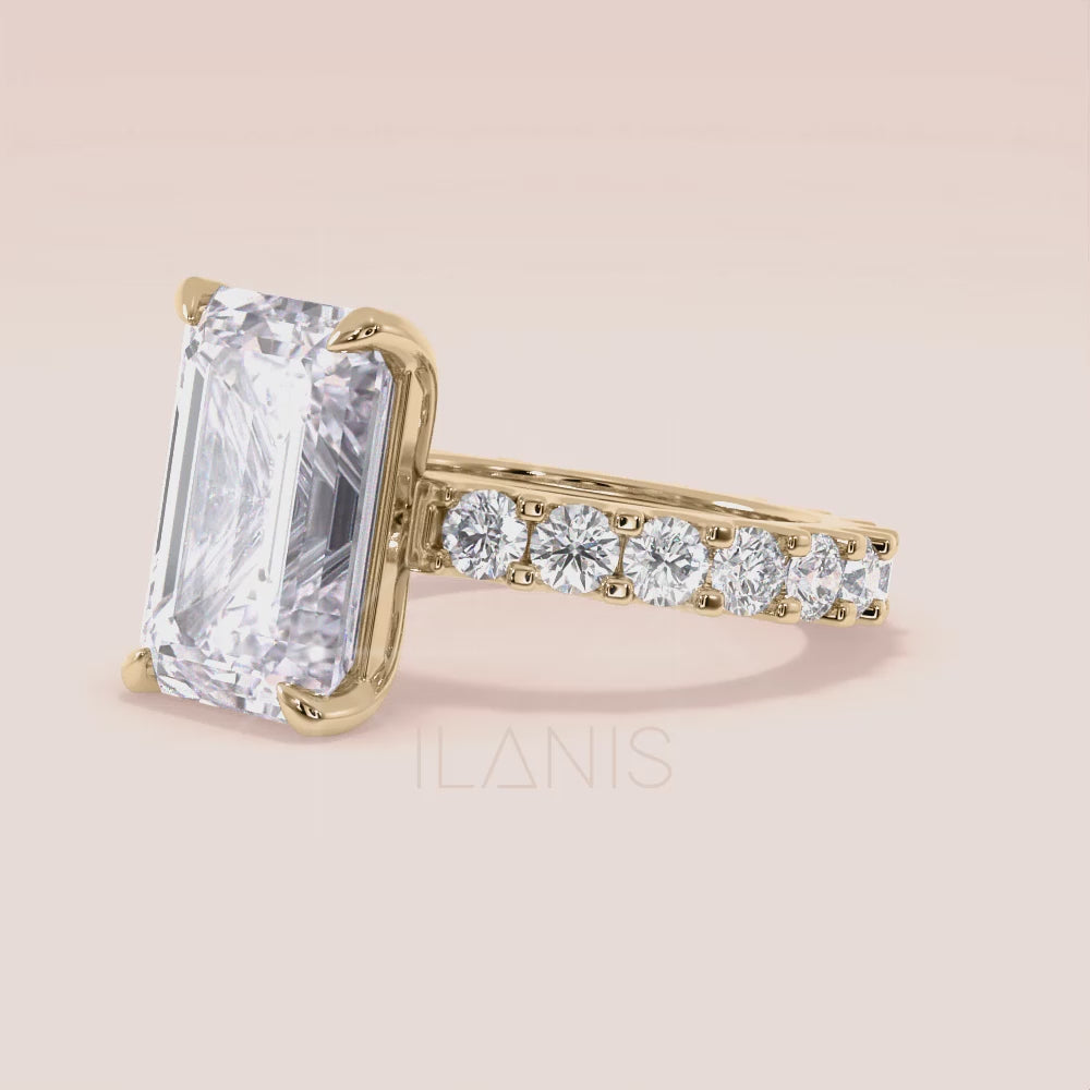 Yellow gold emerald cut diamond engagement ring on hand with eternity band, modern bridal look, elegant proposal ring inspiration | #14KRecycledYellowGold #18KRecycledYellowGold