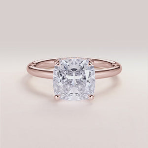 "Rose Gold 14K engagement ring featuring an Oberon cushion cut with an invisible gallery, hidden halo, and plain band.
