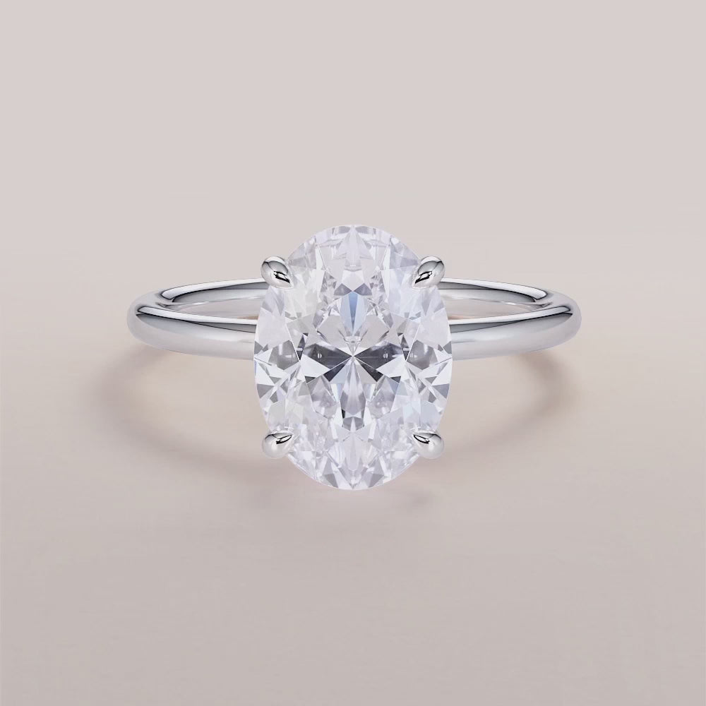 "Elegant 14K White Gold Venus Oval Classic Solitaire Engagement Ring, showcasing timeless beauty and luxurious design.|

#14KRecycledWhiteGold
#18KRecycledWhiteGold








#Platinum"
