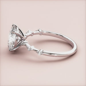 "Stunning 14K white gold oval diamond engagement ring, featuring twinkling accents on a delicate band. Perfect for love!