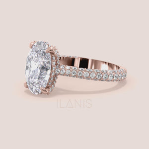 Video of Oval diamond engagement ring in rose gold with pavé band and hidden halo setting 