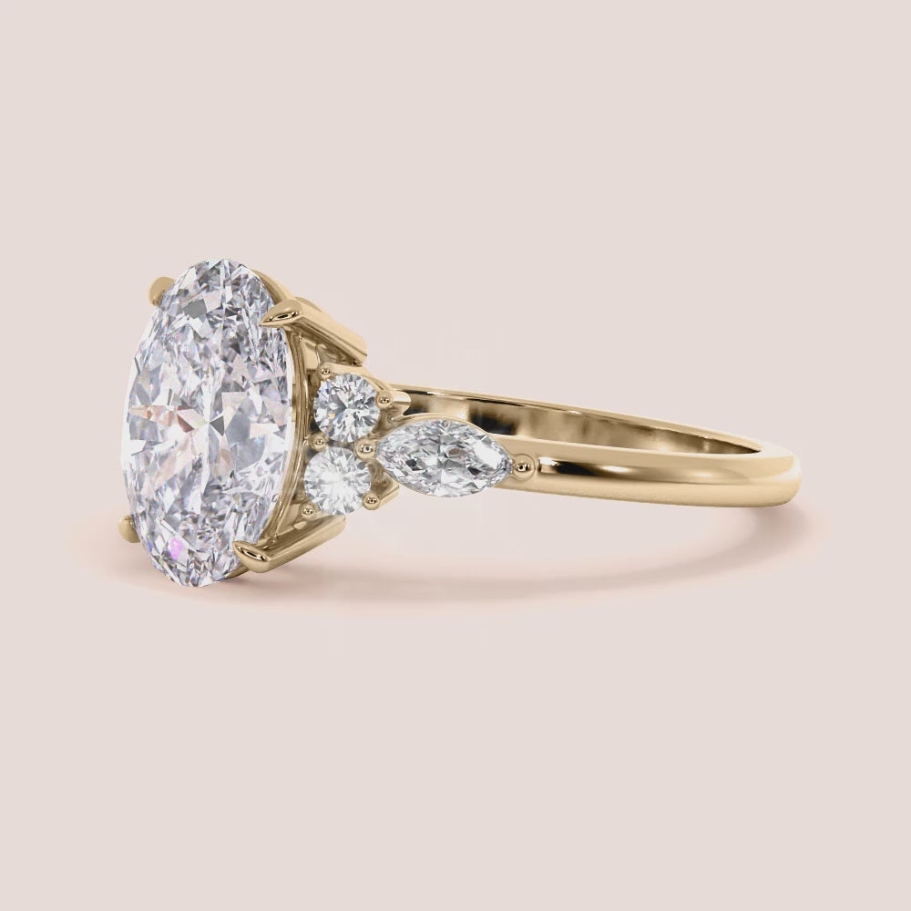 Gold engagement ring with oval-shaped diamond and marquise accents, available in 14K, 18K, or platinum for stunning elegance.
|

#14KRecycledYellowGold #18KRecycledYellowGold 