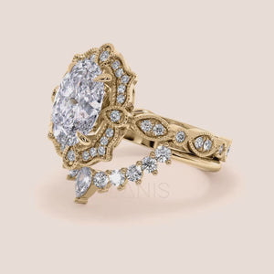 Video of vintage filigree oval halo diamond ring set with matching band in recycled yellow gold 