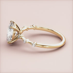 "14K yellow gold IRIS oval diamond twinkles on band engagement ring, perfect for adding elegance to any proposal.