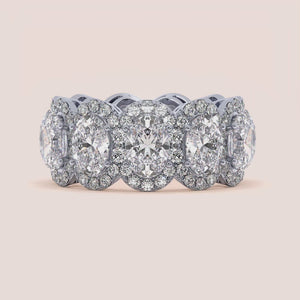 Elegant white gold wedding band featuring an oval eternity trellis design, available in 14K or 18K gold or platinum. 