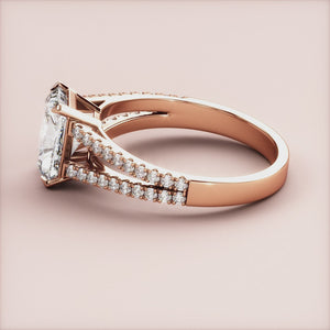 Radiant 14K Rose Gold engagement ring, featuring a cathedral split shank and pave band, perfect for a timeless proposal.