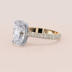 Video of Oval diamond engagement ring in two tone rose and white gold, with pavé band and hidden halo detail 